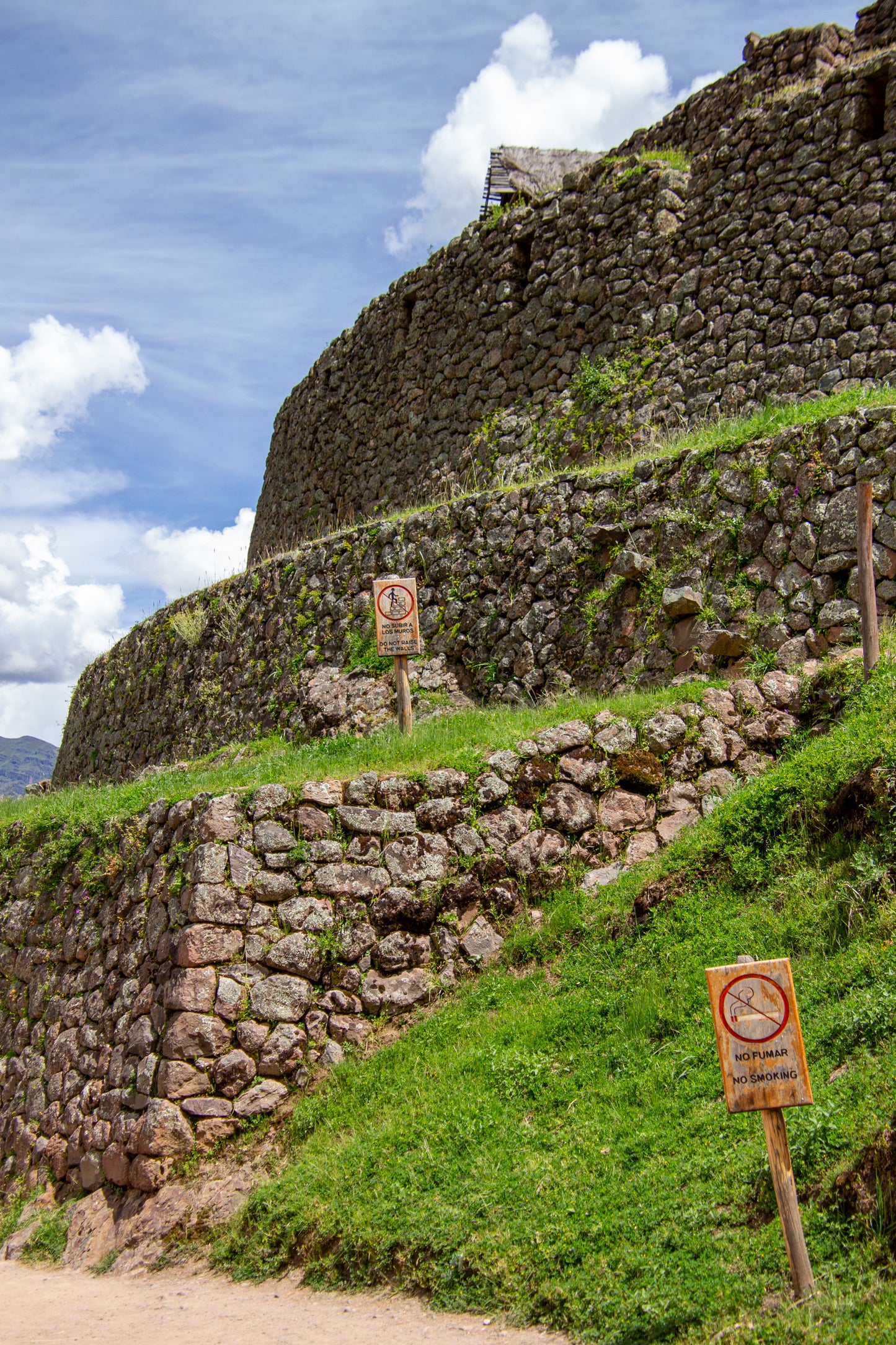 The image captures the timeless allure of Machu Picchu’s stone terraces, rising majestically...