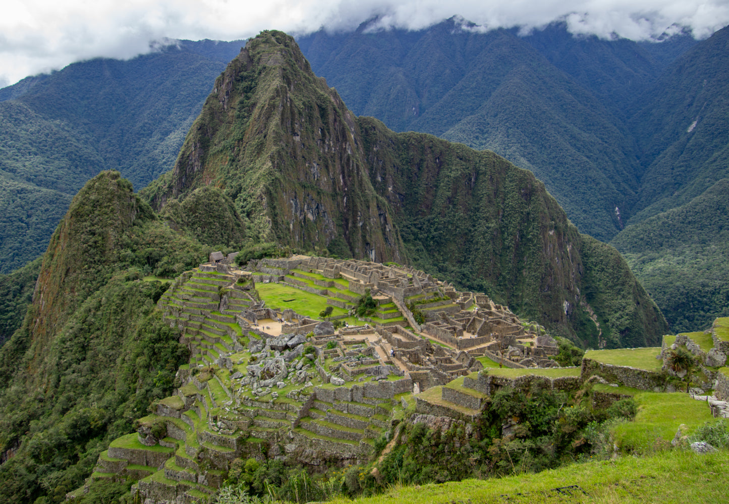 Perched high in the Andes, Machu Picchu emerges from the mist like a timeless sentinel of history