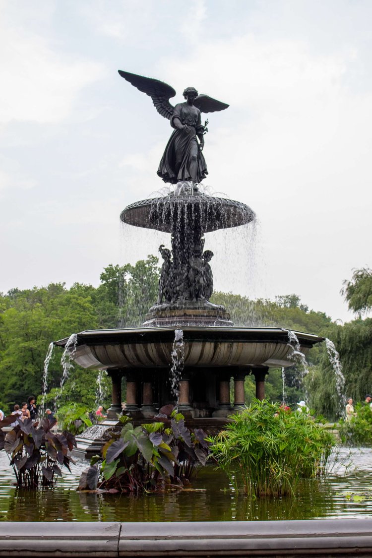 The Angel of the Waters stands gracefully atop Bethesda Fountain, casting an aura of serenity over...