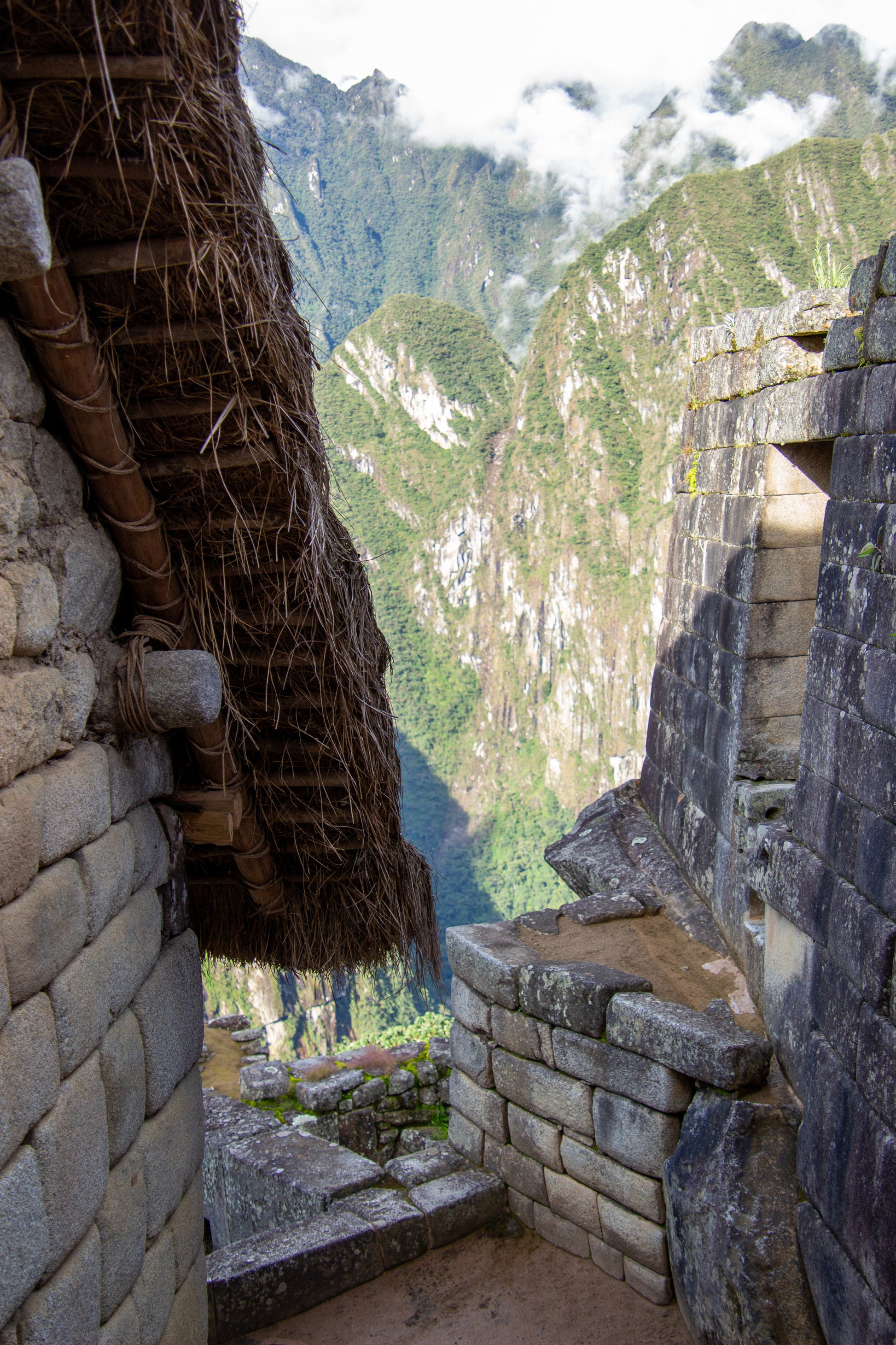 This captivating image captures the intricate dance between the stone structures of Machu Picchu...